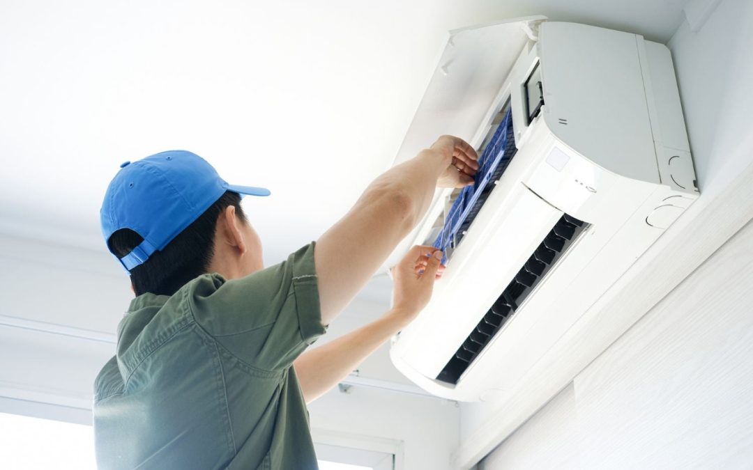 HVAC technician servicing a ductless mini split in Granite Bay